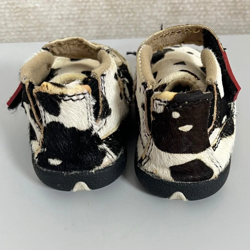 Twisted X Kids Cow Print Moccasins in Black and White